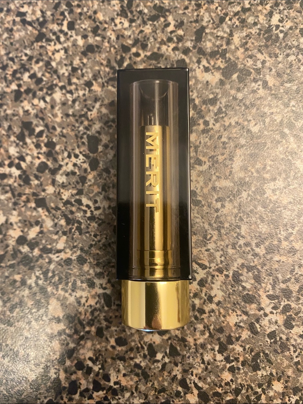 MERIT signature matte lipstick in Black Tie.